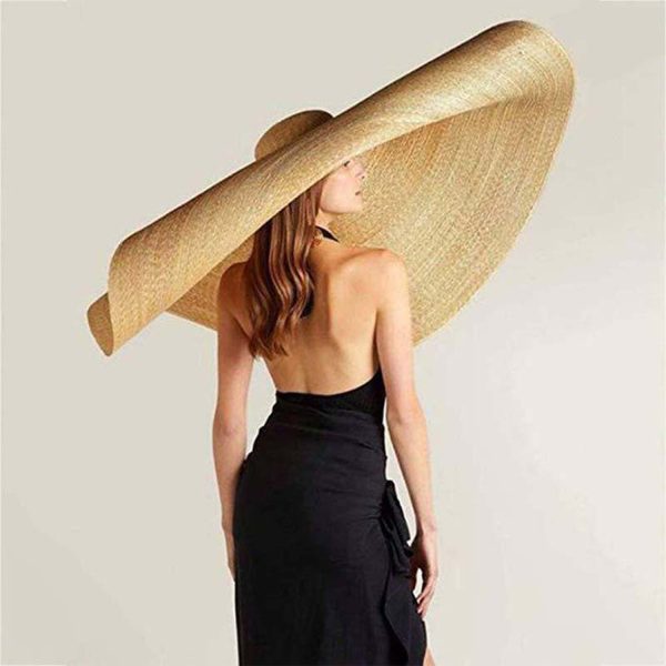 Women's straw hat with sunscreen for beach tourism