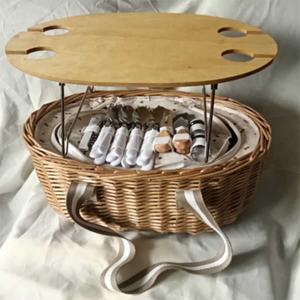 Round portable picnic basket for knife and fork table