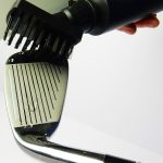 Automatic water-discharging golf club cleaning brush