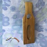 Wooden red wine bottle opener support seat