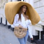 Women's straw hat with sunscreen for beach tourism